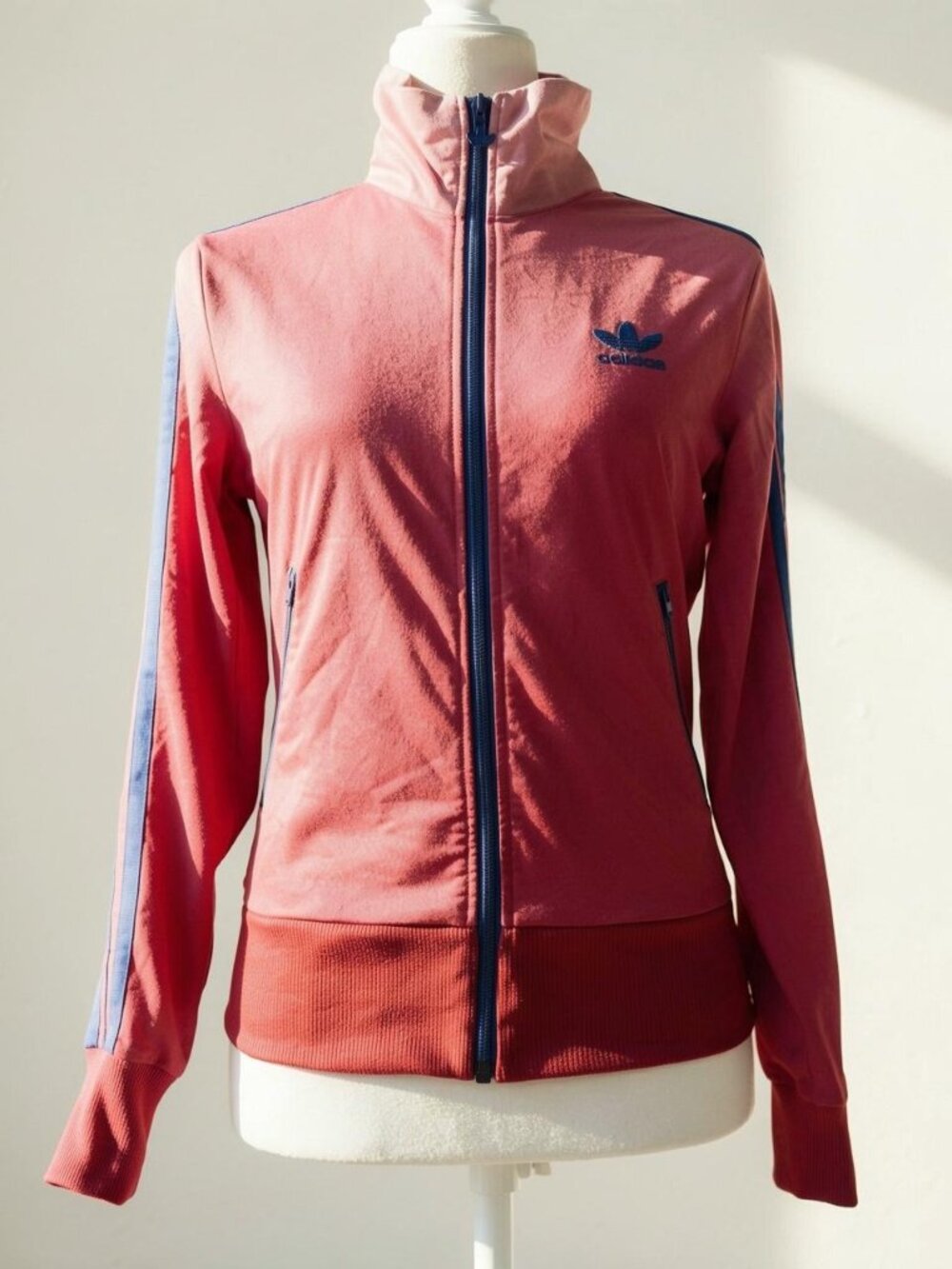 Adidas pink track jacket with blue stripes and logo